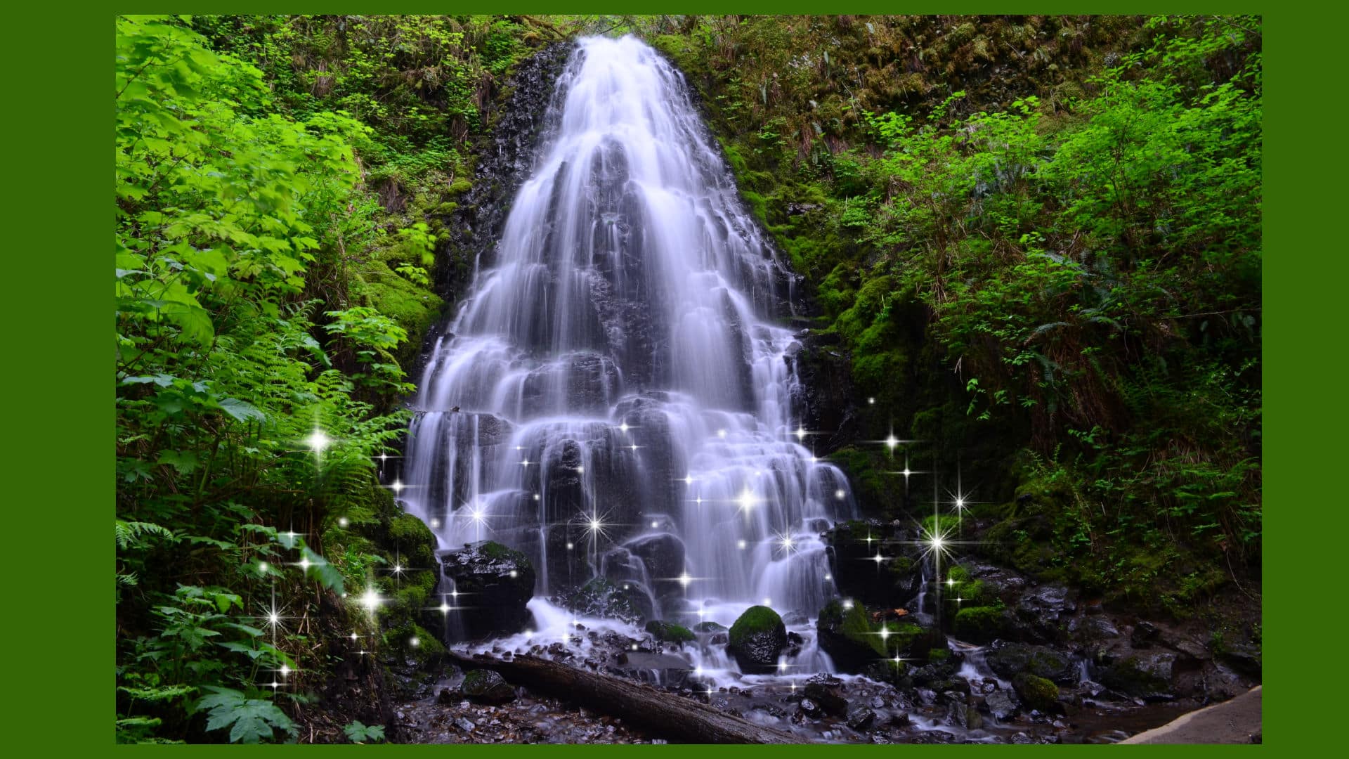 Sparkling Fairy Falls surrounded by lush green forest